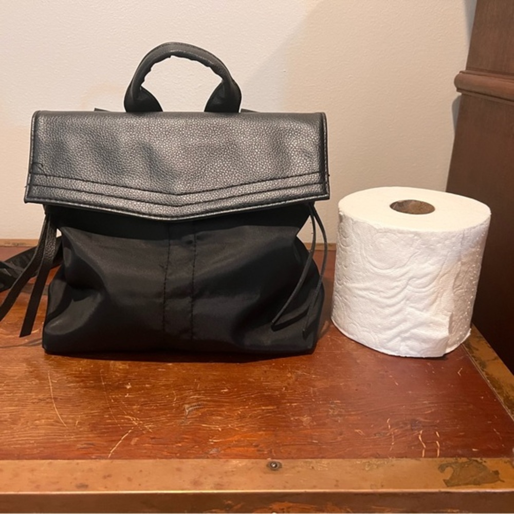 Small black backpack for woman (TP for size comparison)